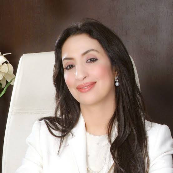 Salwa Idrissi Akhannouch photographed in an office environment.